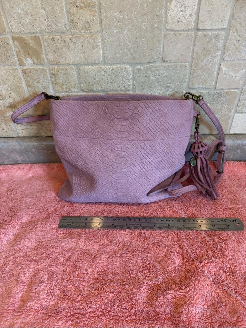 The Sak Lilac Textured Leather Wristlet with Tassel Accent
